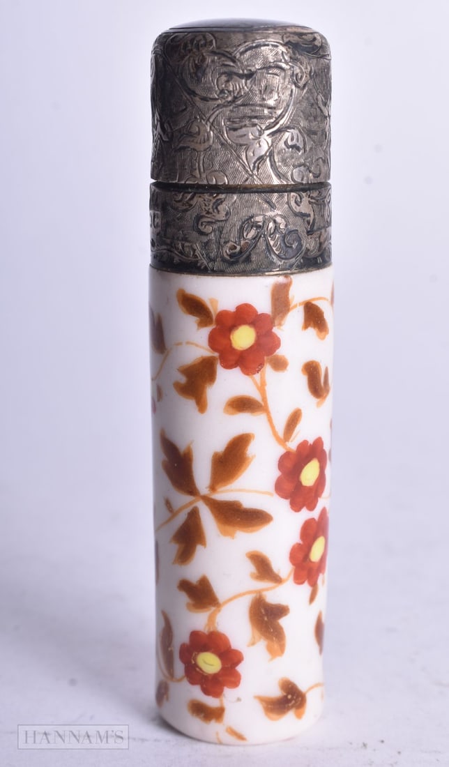 A VICTORIAN SILVER AND PORCELAIN SCENT BOTTLE. 40 grams. 7.75 cm long. (1 of 4)