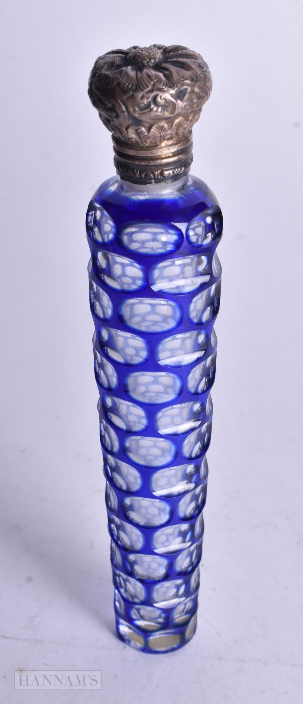 A VICTORIAN SILVER AND BLUE FLASH GLASS SCENT BOTTLE. 90.3 grams. 10 cm high. (1 of 3)