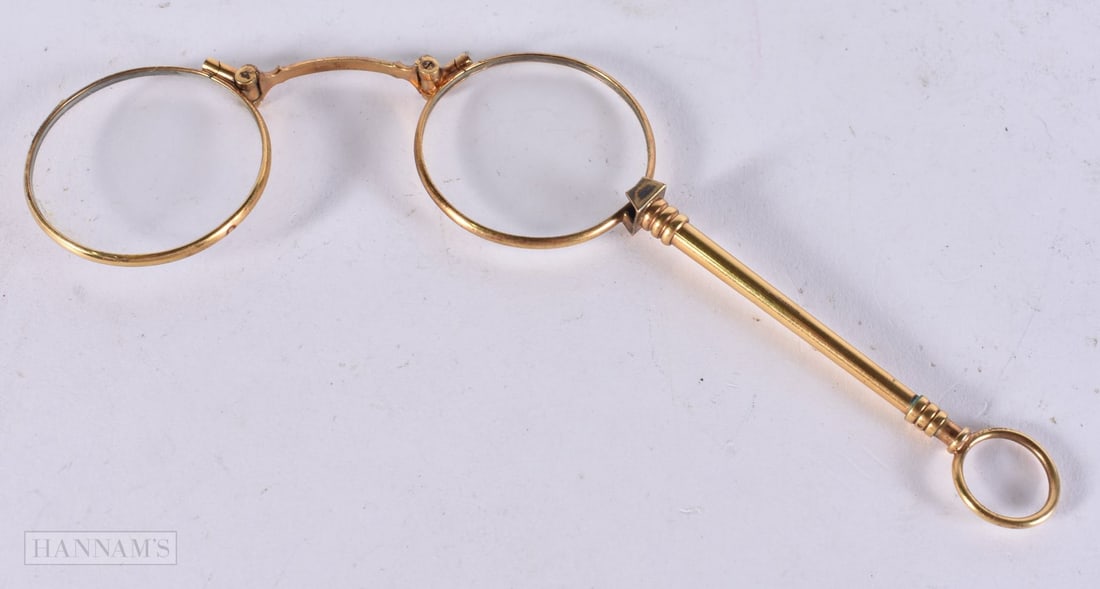 A PAIR OF YELLOW METAL LORGNETTES. 12 cm x 9 cm. (1 of 1)