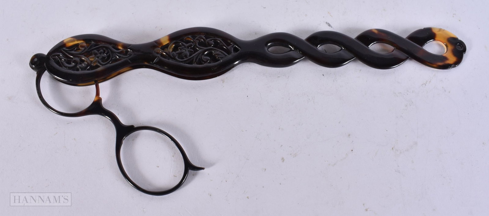 A PAIR OF ANTIQUE TORTOISESHELL LORGNETTES. 32 cm long. (1 of 1)