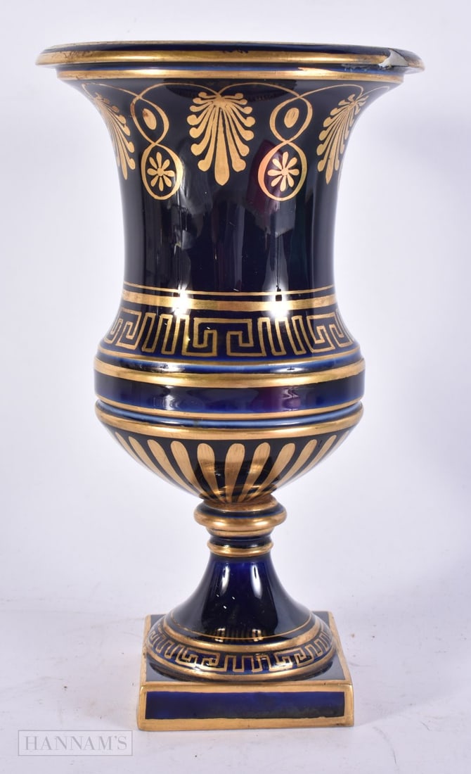 AN EARLY 19TH CENTURY FRENCH BLUE MONOCHROME PORCELAIN VASE painted with gilt motifs. 22 cm high.: AN EARLY 19TH CENTURY FRENCH BLUE MONOCHROME PORCELAIN VASE painted with gilt motifs. 22 cm high.