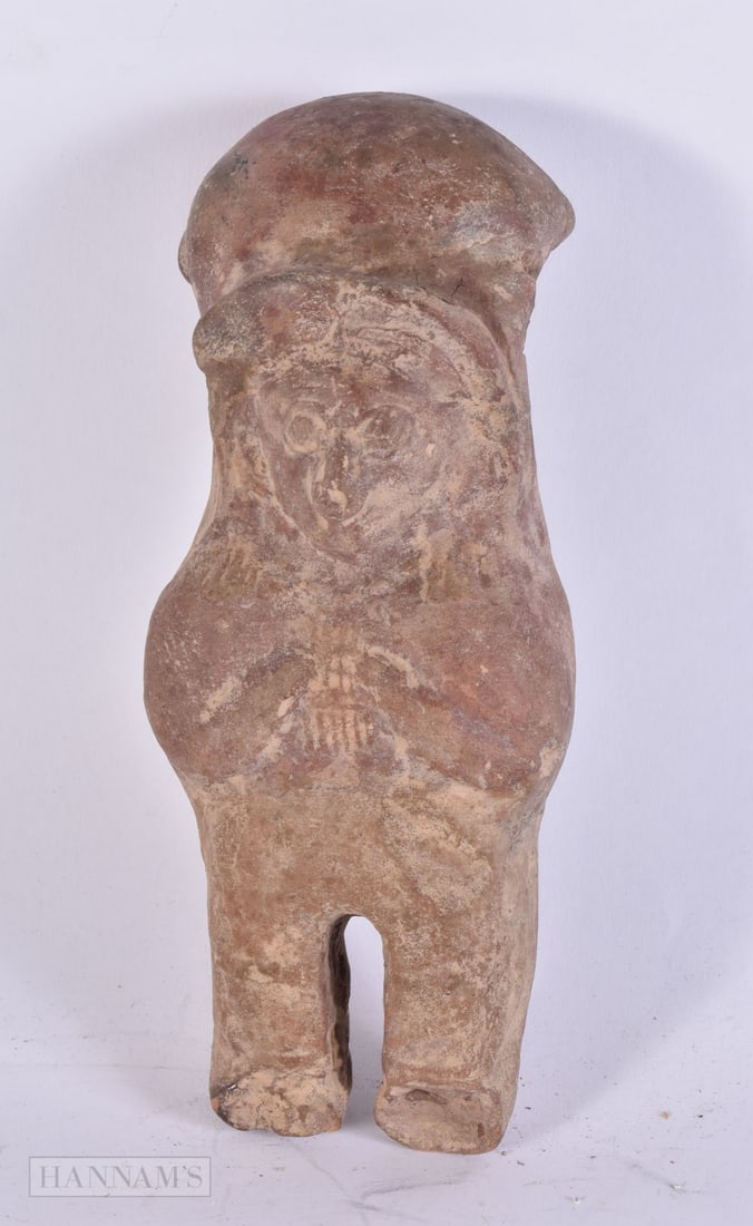 AN EARLY SOUTH AMERICAN POTTERY TRIBAL FIGURE possibly antiquity. 22 cm x 9 cm. (1 of 2)