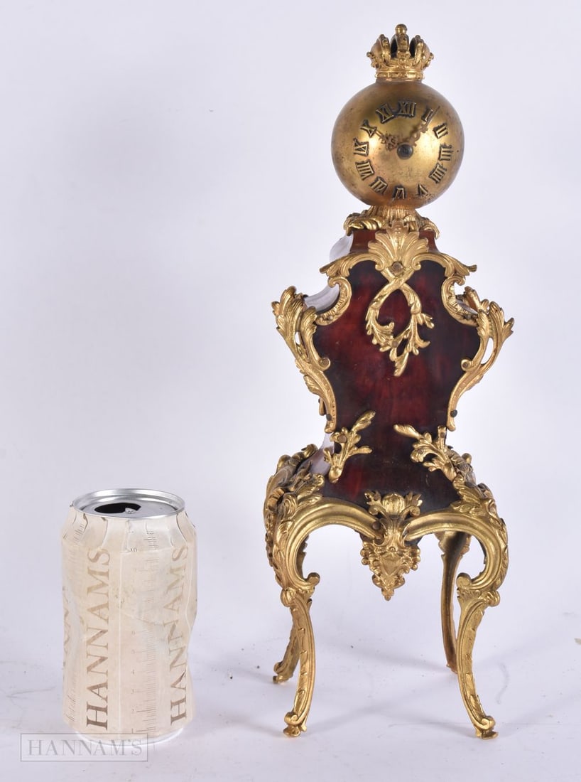 A RARE 19TH CENTURY FRENCH GILT BRONZE AND BOULLE TORTOISESHELL CLOCK of unusual form. 34 cm x 10 cm (1 of 4)