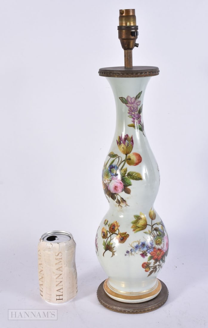 A LARGE 19TH CENTURY FRENCH PORCELAIN LAMP painted with flowers. 46 cm high.: A LARGE 19TH CENTURY FRENCH PORCELAIN LAMP painted with flowers. 46 cm high.