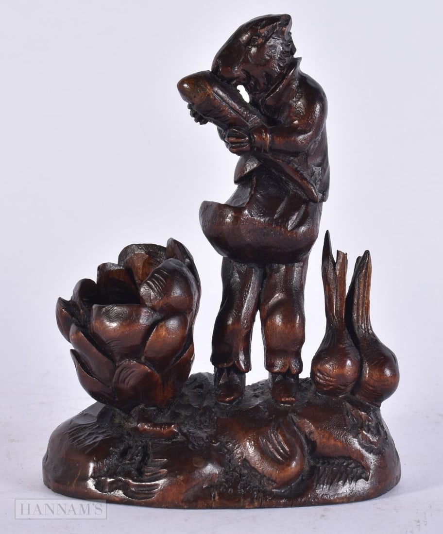 A 19TH CENTURY BAVARIAN BLACK FOREST CARVED WOOD SPILL HOLDER formed as a standing fox. 15 cm high.: A 19TH CENTURY BAVARIAN BLACK FOREST CARVED WOOD SPILL HOLDER formed as a standing fox. 15 cm high.