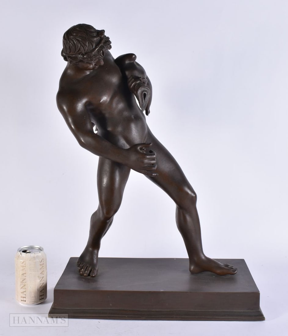 A VERY LARGE 19TH CENTURY GRAND TOUR BRONZE FIGURE After the antiquity, modelled as a nude male upon: A VERY LARGE 19TH CENTURY GRAND TOUR BRONZE FIGURE After the antiquity, modelled as a nude male upon a rectangular base. 58 cm x 34 cm.