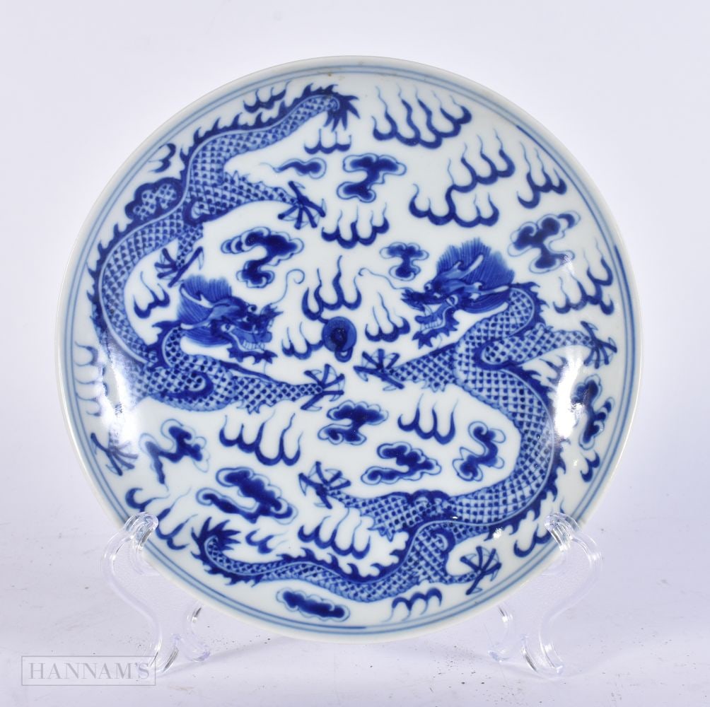 A CHINESE BLUE AND WHITE PORCELAIN DRAGON DISH. 16.5 cm wide. (1 of 2)