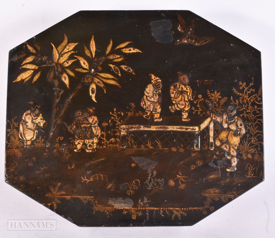 A GEORGE III COUNTRY HOUSE LACQUERED GAMING BOX decorated in relief with figures in a landscape. 27 (1 of 6)