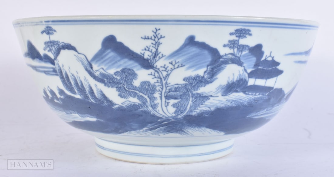A 17TH CENTURY CHINESE BLUE AND WHITE PORCELAIN BOWL Chongzhen, painted with landscapes. 26 cm diame (1 of 4)