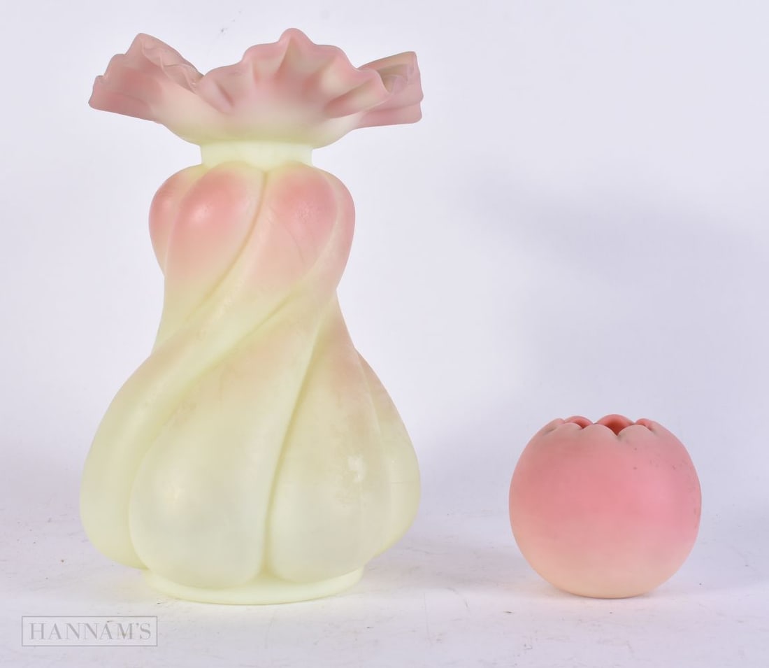 A VICTORIAN/EDWARDIAN PEACH BLOOM GLASS FRILLED VASE together with a smaller vase. Largest 18 cm hig: A VICTORIAN/EDWARDIAN PEACH BLOOM GLASS FRILLED VASE together with a smaller vase. Largest 18 cm high. (2)