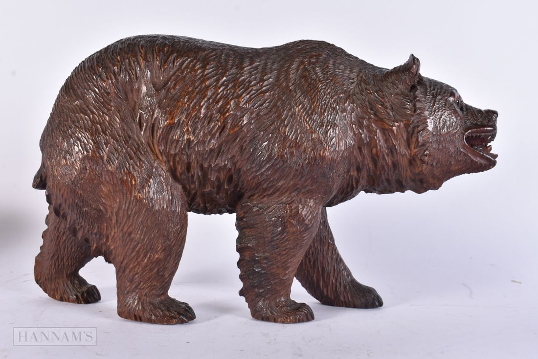 A 19TH CENTURY BAVARIAN BLACK FOREST CARVED WOOD FIGURE OF A ROAMING BEAR. 32 cm x 20 cm. (1 of 5)