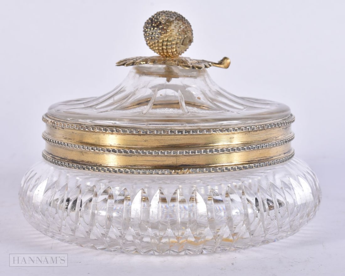 A SILVER GILT AND CUT CRYSTAL GLASS BOX. Birmingham 1938. 13 cm wide.: A SILVER GILT AND CUT CRYSTAL GLASS BOX. Birmingham 1938. 13 cm wide.