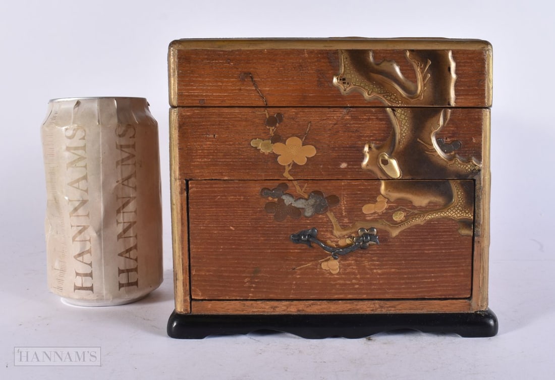 A 19TH CENTURY JAPANESE MEIJI PERIOD LACQUERED WOOD BOX with pull out drawer, decorated in relief wi: A 19TH CENTURY JAPANESE MEIJI PERIOD LACQUERED WOOD BOX with pull out drawer, decorated in relief with trees and vines. 25 cm x 15 cm.