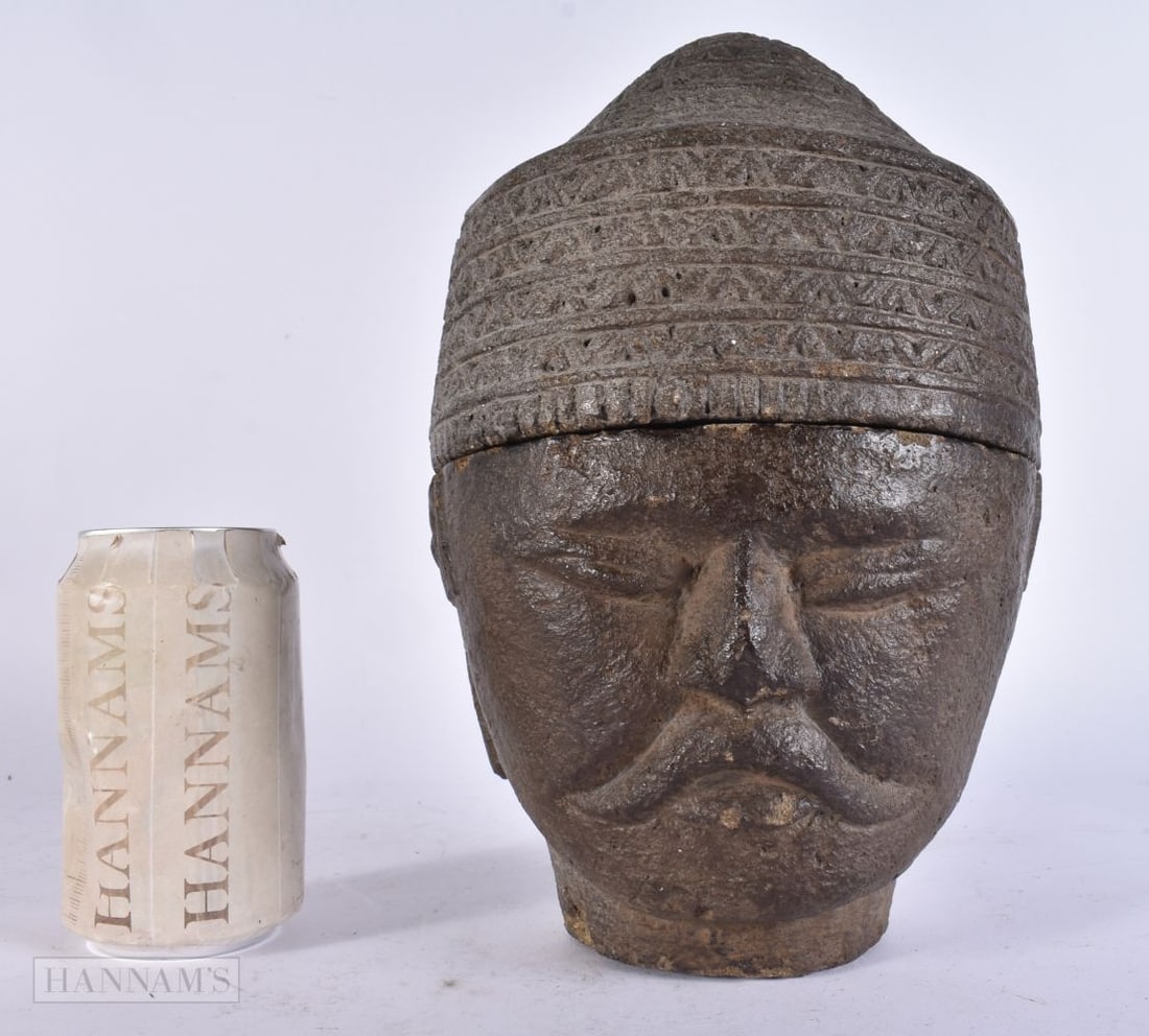 AN 18TH/19TH CENTURY SOUTH EAST ASIAN CARVED STONE JAR AND COVER formed as a male. 17 cm x 14 cm.: AN 18TH/19TH CENTURY SOUTH EAST ASIAN CARVED STONE JAR AND COVER formed as a male. 17 cm x 14 cm.