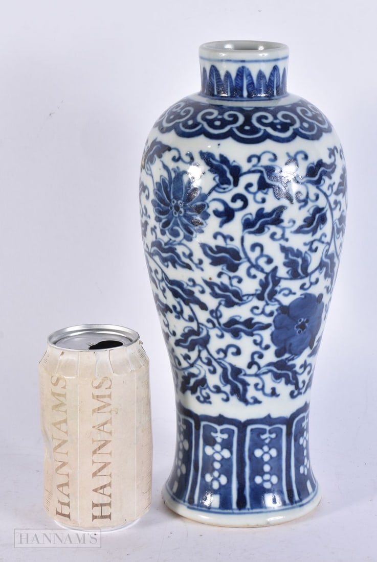 A LARGE 19TH CENTURY CHINESE BLUE AND WHITE PORCELAIN VASE Qing, painted with flowers. 28.5 cm high.: A LARGE 19TH CENTURY CHINESE BLUE AND WHITE PORCELAIN VASE Qing, painted with flowers. 28.5 cm high.