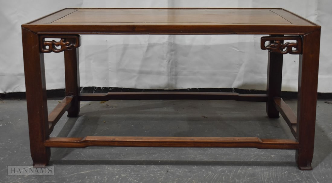 A 19TH CENTURY CHINESE CARVED WOOD LOW TABLE possibly huanghuali. 76 cm x 50 cm x 39 cm. (1 of 4)