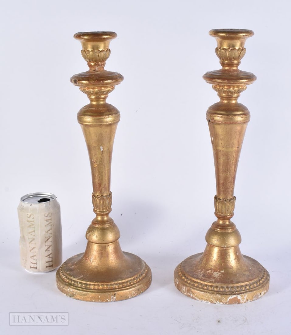 A PAIR OF 19TH CENTURY GILTWOOD CANDLESTICKS. 37 cm high. (1 of 4)
