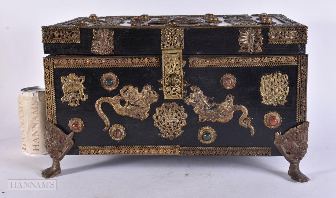 A LARGE 19TH CENTURY TIBETAN BRONZE AND AGATE CASKET decorated in relief with dragons and pierced pa: A LARGE 19TH CENTURY TIBETAN BRONZE AND AGATE CASKET decorated in relief with dragons and pierced panels. 38 cm x 24 cm x 24 cm.