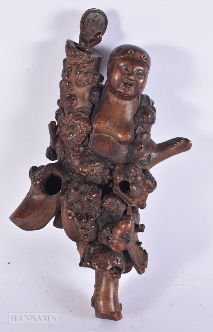 A 19TH CENTURY CHINESE CARVED ROOTWOOD FIGURE OF AN IMMORTAL Late Qing. 29 cm high.: A 19TH CENTURY CHINESE CARVED ROOTWOOD FIGURE OF AN IMMORTAL Late Qing. 29 cm high.