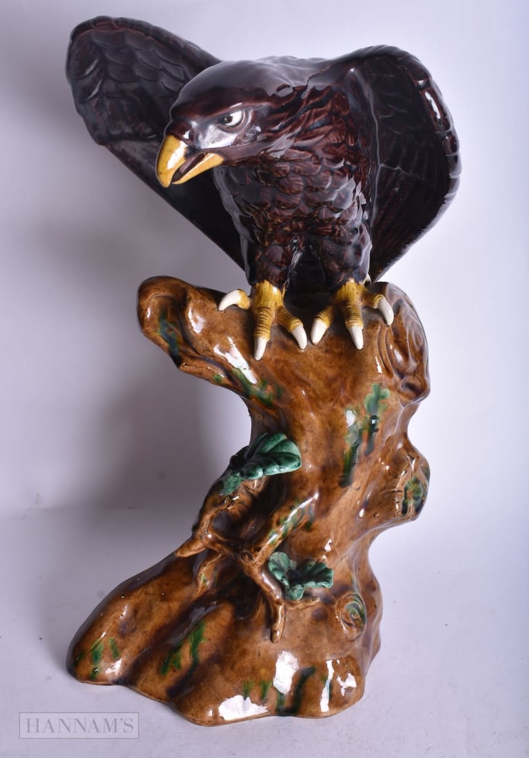 A MID 20TH CENTURY JAPANESE PORCELAIN FIGURE OF A EAGLE PERCHED ON A NATURALISTIC BASE. 29.5 x 16 cm (1 of 4)