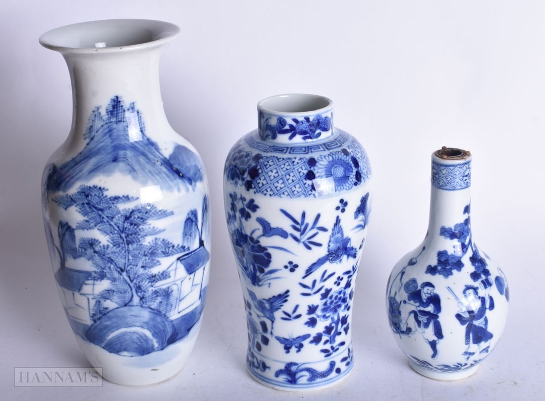THREE CHINESE BLUE AND WHITE VASES. 23 cm high. (3): THREE CHINESE BLUE AND WHITE VASES. 23 cm high. (3)