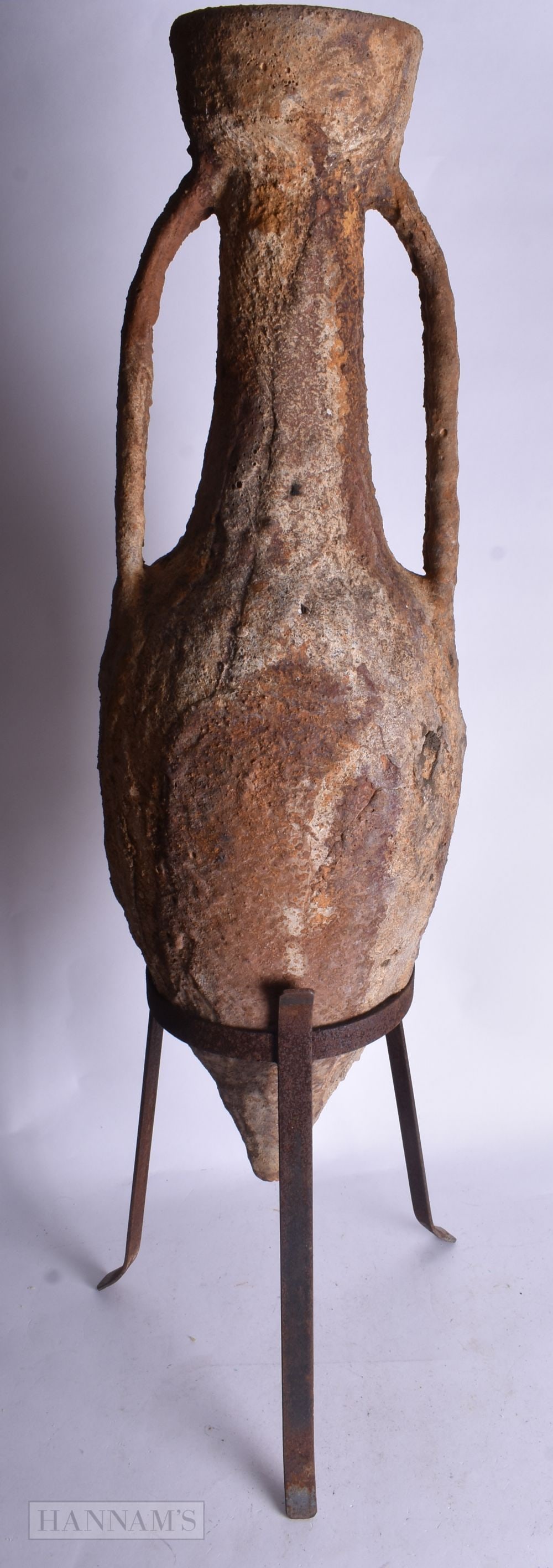 A LARGE POTTERY ROMAN AMPHORA VASE. 73 x 19 cm. (1 of 4)