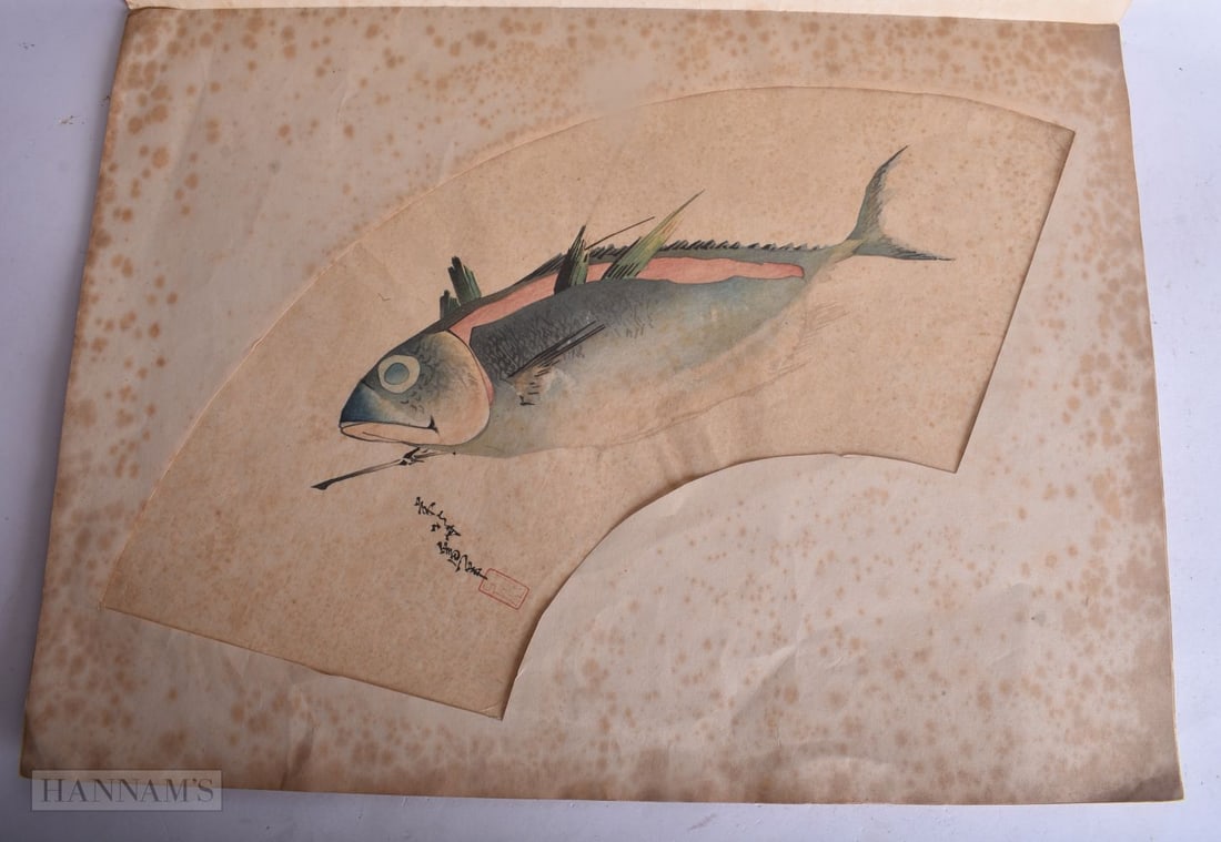 A FAN SHAPED PAINTING DEPICTING A KATSUO FISH DETAILED WITH FINE GREEN, BLUE AND SOFT PINK GRADATION: A FAN SHAPED PAINTING DEPICTING A KATSUO FISH DETAILED WITH FINE GREEN, BLUE AND SOFT PINK GRADATIONS OVER A MOTTLED CREAM GROUND, SIGNED BY UTAGAWA HIROSHIGE (1797-1858). 17 x 46 cm.