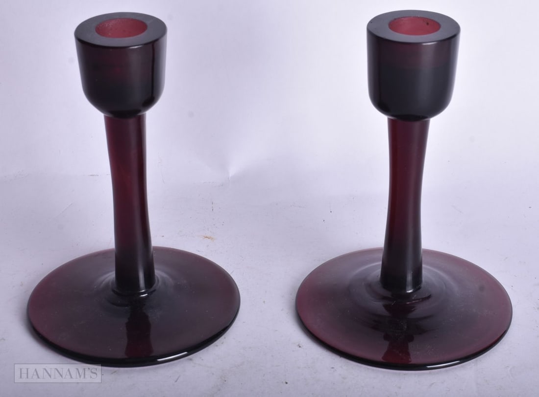 A PAIR OF BEIJING AMETHYST GLASS CANDLE STICKS. 13 x 9 cm. (1 of 3)