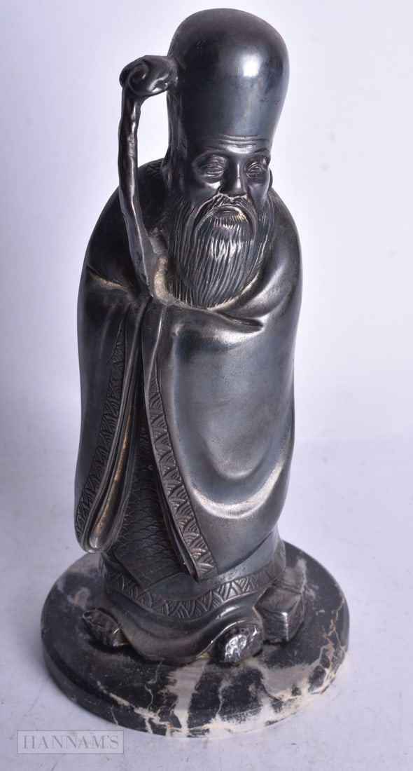 A CHINESE PEWTER FIGURE OF SHOU LAO. 18.5 cm high.: A CHINESE PEWTER FIGURE OF SHOU LAO. 18.5 cm high.