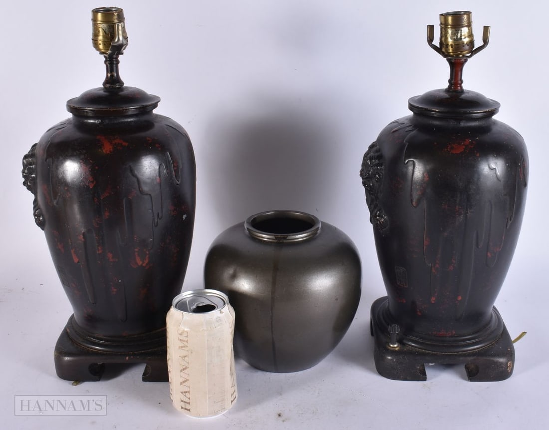 A PAIR OF JAPANESE BRONZE SHI SHI TABLE LAMPS TOGETHER WITH A JAPANESE BRONZE MIXED METAL VASE. 38: A PAIR OF JAPANESE BRONZE SHI SHI TABLE LAMPS TOGETHER WITH A JAPANESE BRONZE MIXED METAL VASE. 38 15 cm. (3)