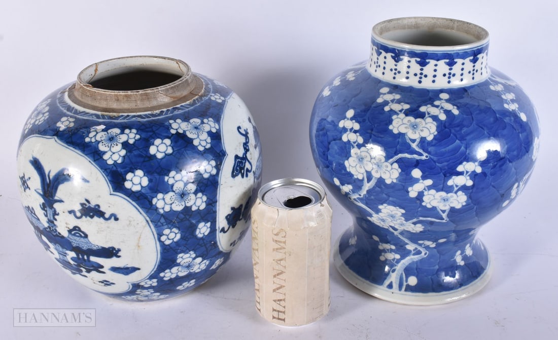 A CHINESE BLUE AND WHITE PRUNUS BALUSTER VASE TOGETHER WITH A CHINESE BLUE AND WHITE GINGER JAR. 23: A CHINESE BLUE AND WHITE PRUNUS BALUSTER VASE TOGETHER WITH A CHINESE BLUE AND WHITE GINGER JAR. 23 x 20 cm. (2)