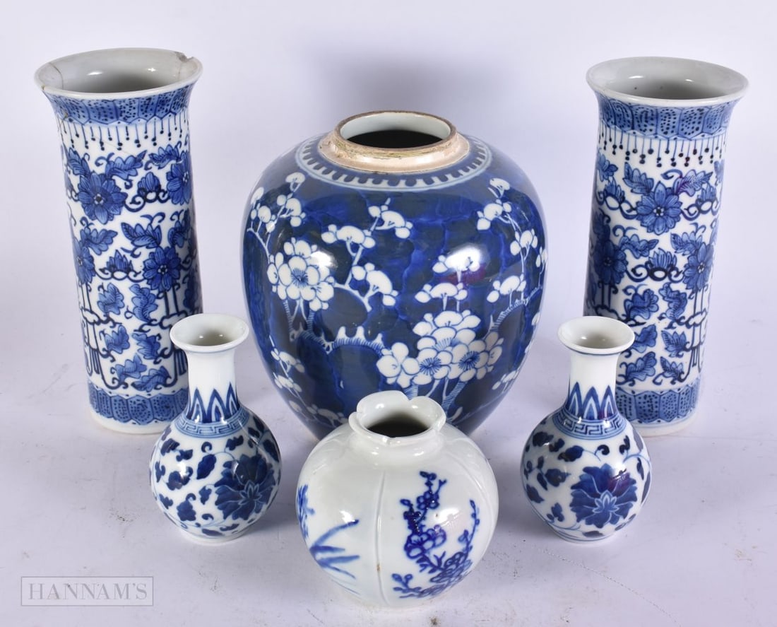 A PAIR OF CHINESE BLUE AND WHITE FOLIATE SCROLL GU VASES TOGETHER WITH A BLUE AND WHITE PRUNUS GINGE (1 of 3)