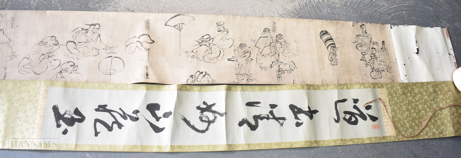 AFTER TOBA SOJO (1053-1140) A JAPANESE SCROLL INK ON PAPER DEPICTING FROLICKING ANIMALS AND HUMANS T: AFTER TOBA SOJO (1053-1140) A JAPANESE SCROLL INK ON PAPER DEPICTING FROLICKING ANIMALS AND HUMANS TOGETHER WITH A CALLIGRAPHY SCROLL. 940 x 30 cm. (2)