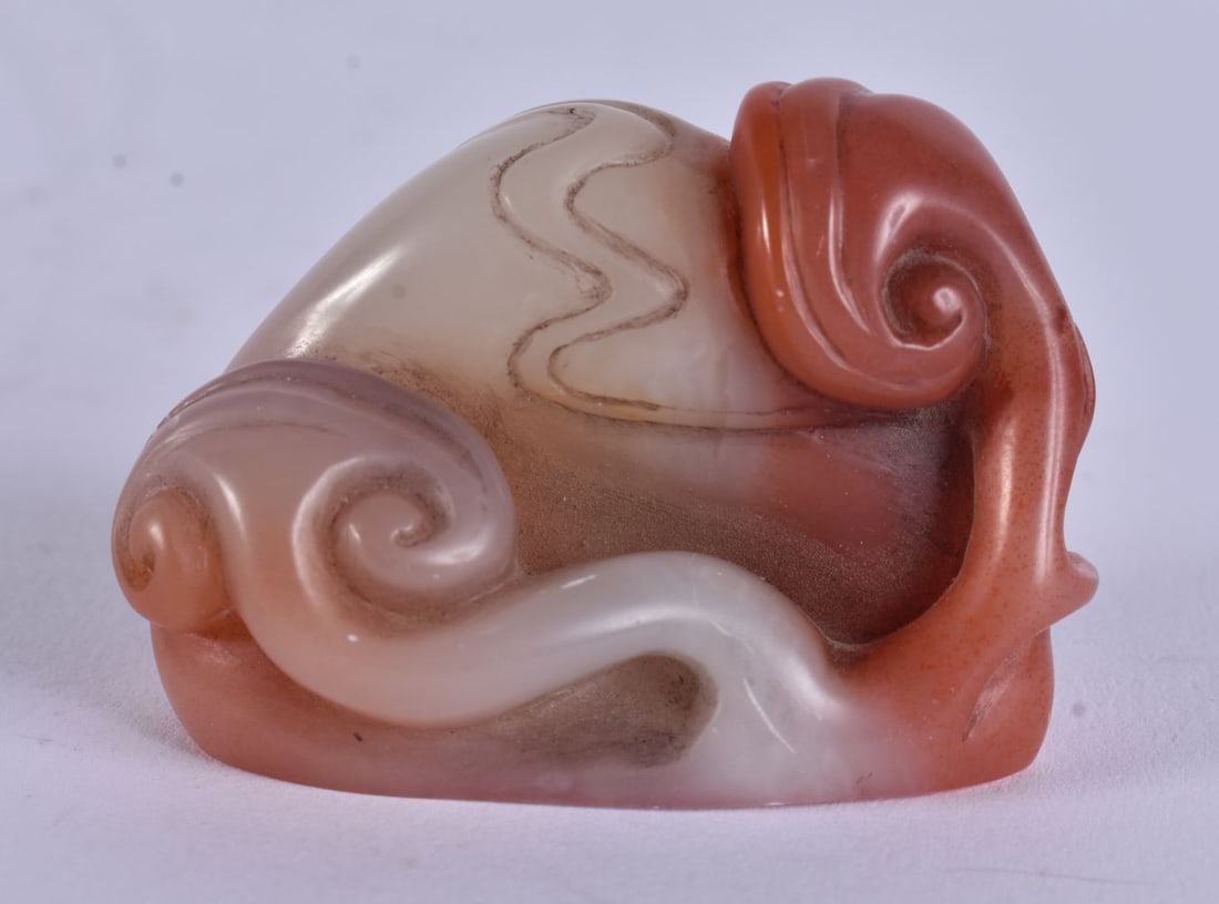 A CHINESE QING DYNASTY CARVED CARNELIAN AGATE SEAL. 5 cm x 3.25 cm.: A CHINESE QING DYNASTY CARVED CARNELIAN AGATE SEAL. 5 cm x 3.25 cm.