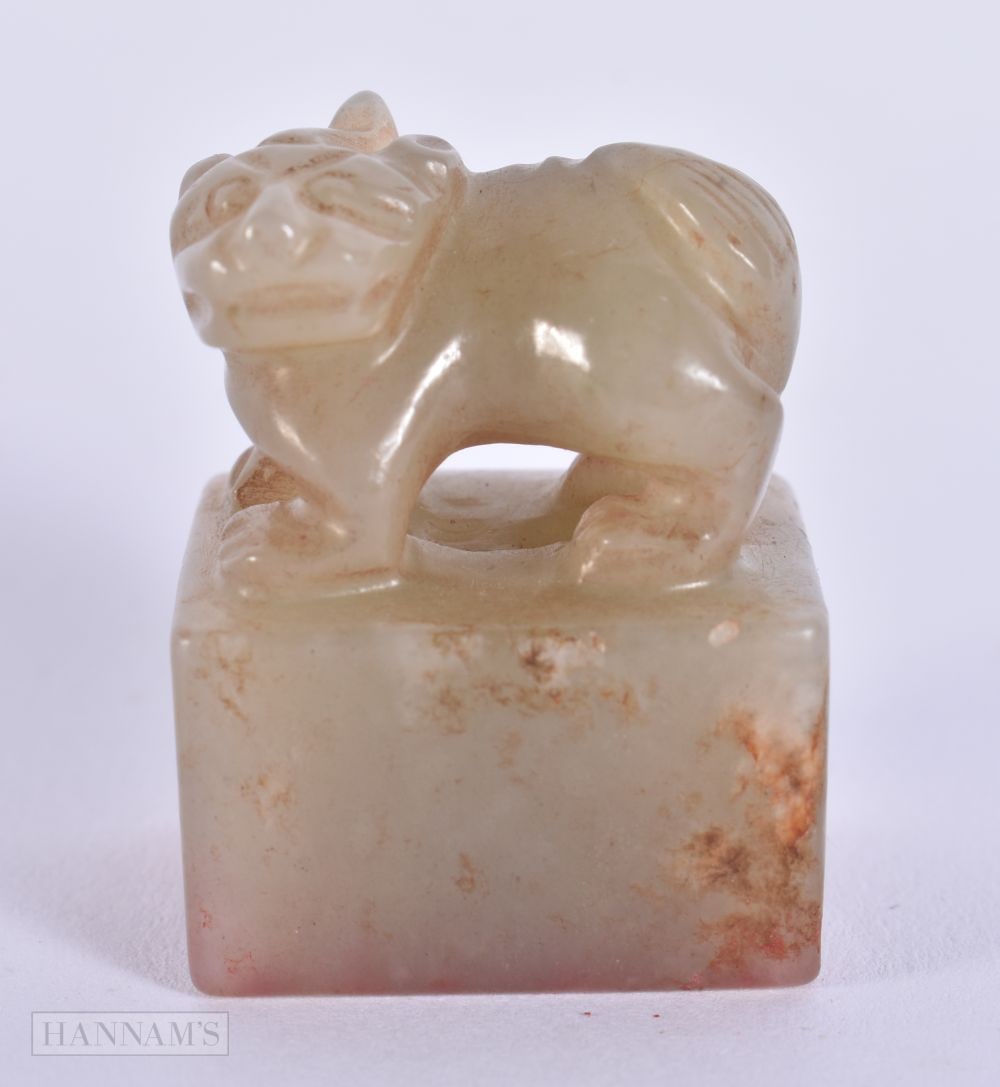 A CHINESE QING DYNASTY GREYISH RUSSET JADE BEAST SEAL. 2.75 cm x 3.25 cm.: A CHINESE QING DYNASTY GREYISH RUSSET JADE BEAST SEAL. 2.75 cm x 3.25 cm.