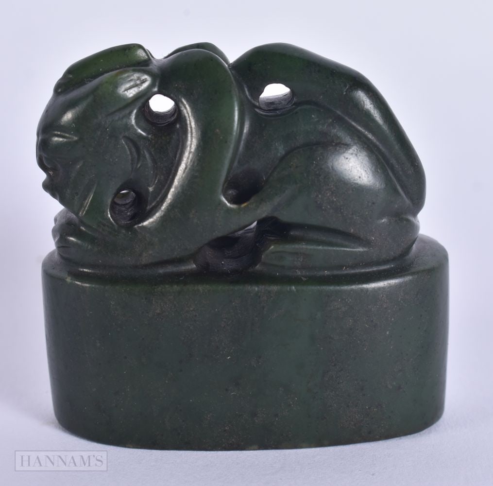 A CHINESE QING DYNASTY CARVED SPINACH JADE BEAST SEAL. 4.75 cm x 4.75 cm. (1 of 6)