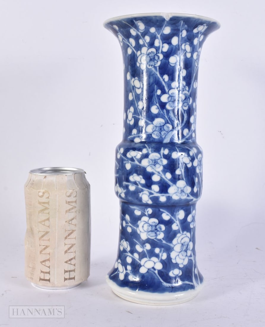A 19TH CENTURY CHINESE BLUE AND WHITE GU FORM BEAKER VASE bearing Kangxi marks to base. 25.5 cm high: A 19TH CENTURY CHINESE BLUE AND WHITE GU FORM BEAKER VASE bearing Kangxi marks to base. 25.5 cm high.