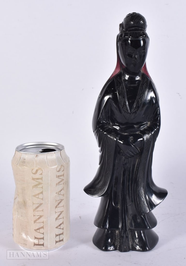 AN UNUSUAL 19TH CENTURY CHINESE AMETHYST GLASS FIGURE OF AN IMMORTAL Qing. 26.5 cm high.: AN UNUSUAL 19TH CENTURY CHINESE AMETHYST GLASS FIGURE OF AN IMMORTAL Qing. 26.5 cm high.