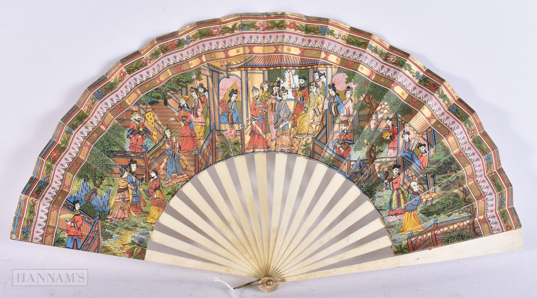 A LATE 19TH CENTURY ORIENTAL BONE FAN decorated with figures. 48 cm wide. (1 of 4)
