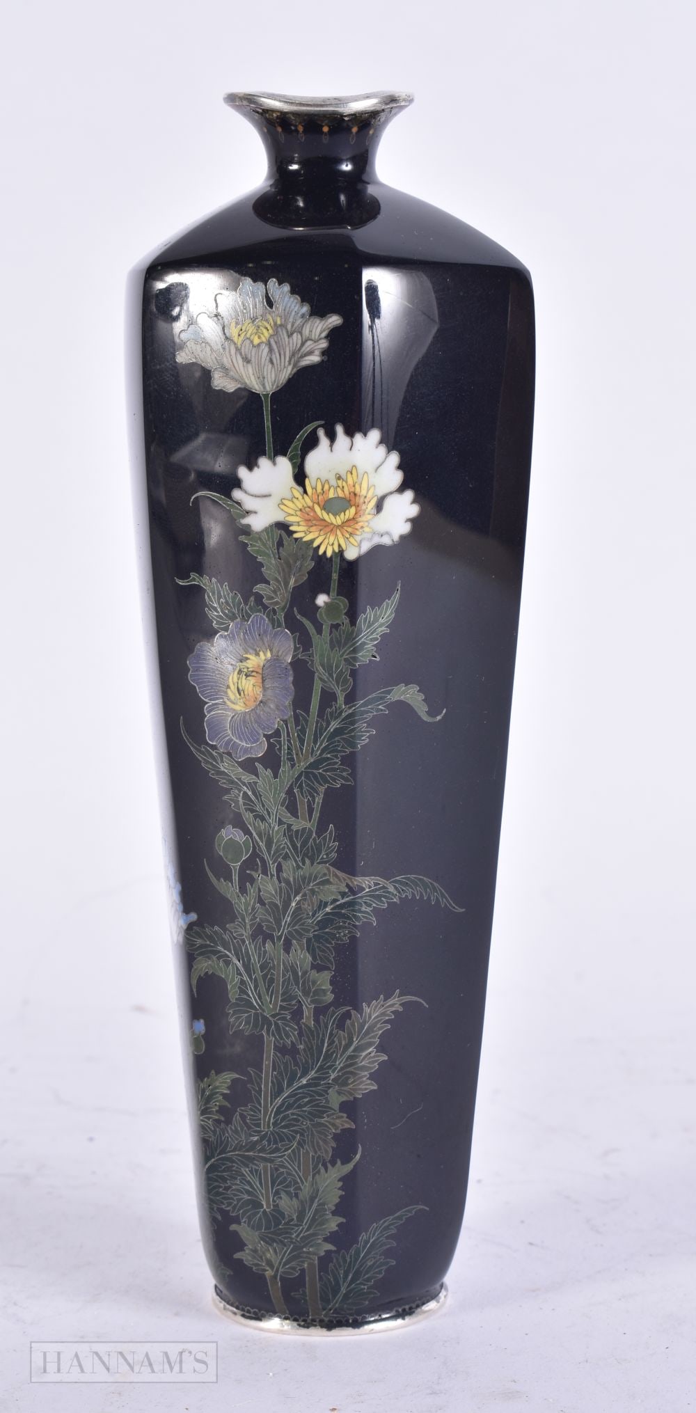 A LATE 19TH CENTURY JAPANESE MEIJI PERIOD SILVER MOUNTED CLOISONNE ENAMEL VASE decorated with flower: A LATE 19TH CENTURY JAPANESE MEIJI PERIOD SILVER MOUNTED CLOISONNE ENAMEL VASE decorated with flowers. 18.5 cm high.