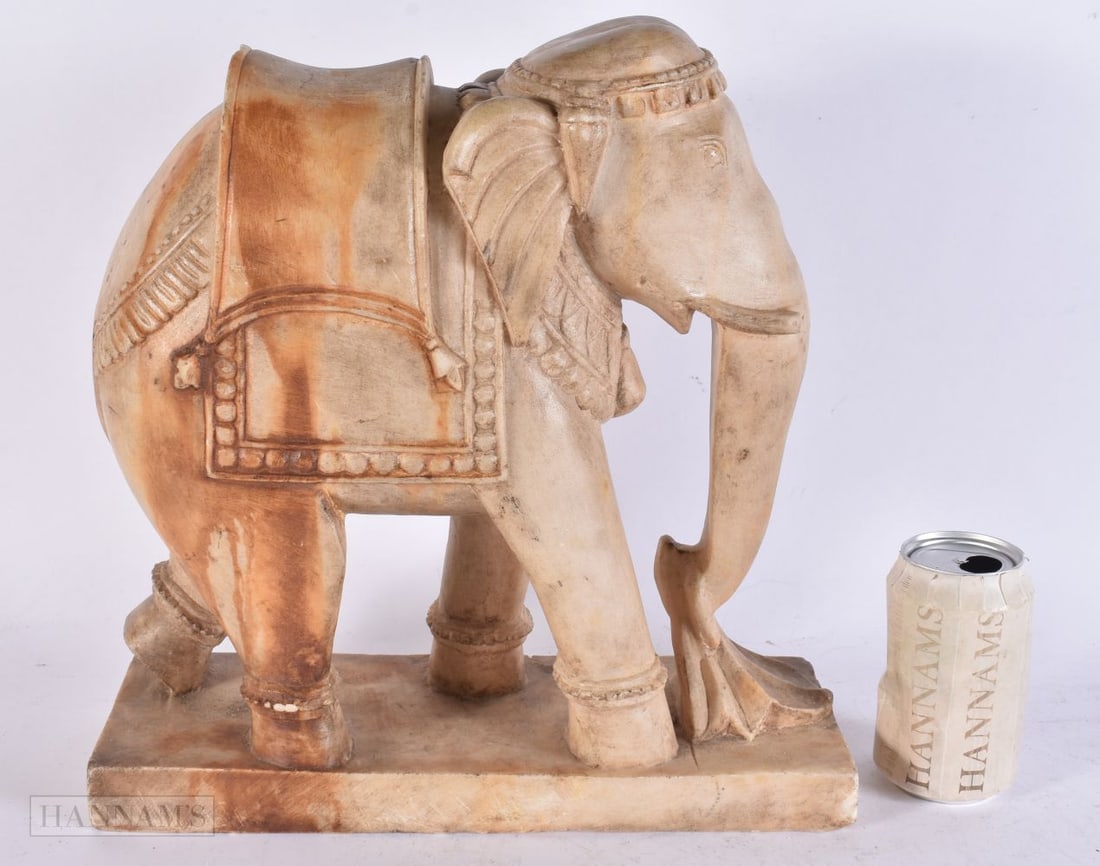 A LARGE 19TH CENTURY INDIAN CARVED RAJASTHAN MARBLE ELEPHANT. 35 cm x 32 cm. (1 of 6)