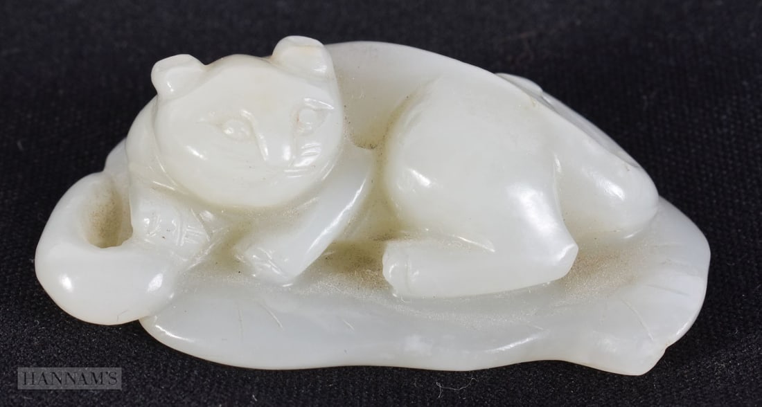 A CHINESE QING DYNASTY CARVED GREENISH WHITE JADE CAT. 5.75 cm x 3.25 cm. (1 of 10)