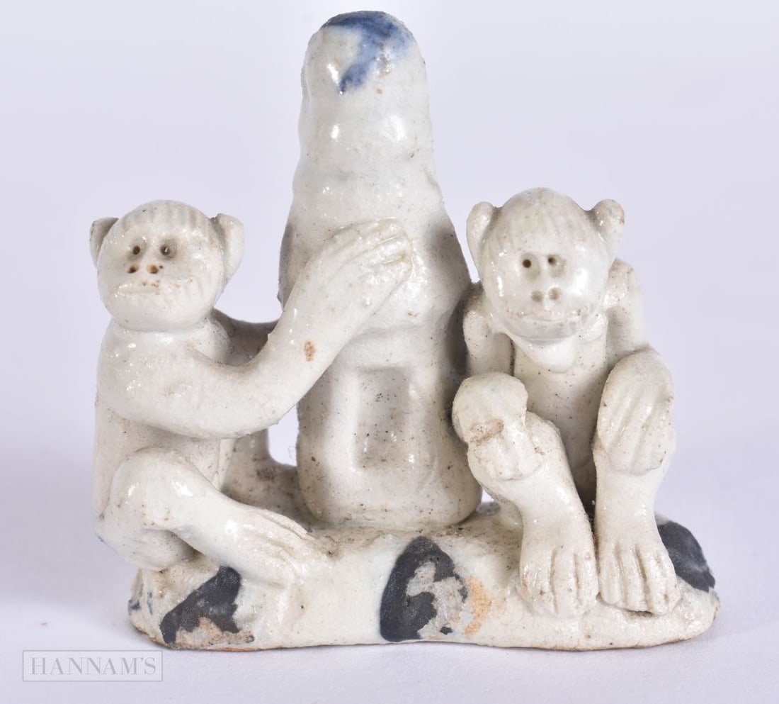 A 17TH CENTURY CHINESE BLANC DE CHINE PORCELAIN FIGURE Kangxi, modelled as two monkeys. 4.75 cm x 4. (1 of 3)