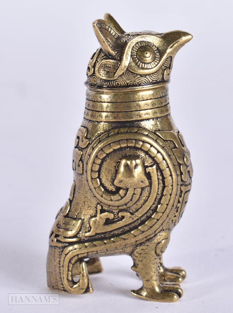 A CHINESE QING DYNASTY BRONZE FIGURE OF A ZOOMORPHIC BIRD. 5 cm high.: A CHINESE QING DYNASTY BRONZE FIGURE OF A ZOOMORPHIC BIRD. 5 cm high.
