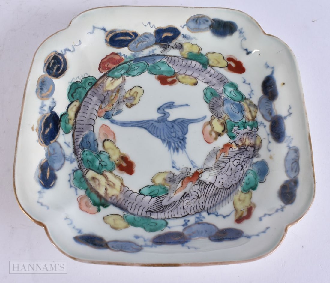 AN 18TH CENTURY JAPANESE EDO PERIOD AO KUTANI DISH painted with a bird. 18.5 cm square.: AN 18TH CENTURY JAPANESE EDO PERIOD AO KUTANI DISH painted with a bird. 18.5 cm square.
