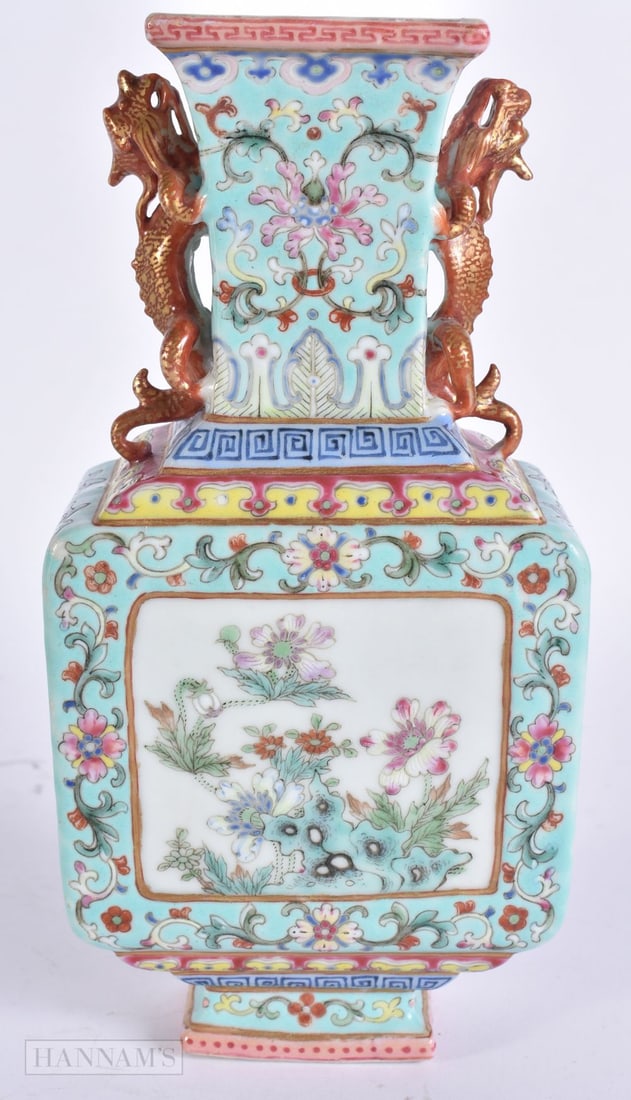 A CHINESE FAMILLE ROSE TURQUOISE GROUND PORCELAIN VASE with coral ground chilong dragon handles. 19: A CHINESE FAMILLE ROSE TURQUOISE GROUND PORCELAIN VASE with coral ground chilong dragon handles. 19 cm x 9 cm.