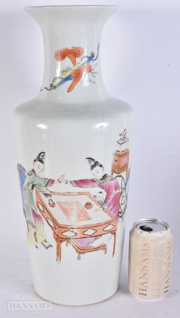 A LARGE LATE 19TH CENTURY CHINESE FAMILLE ROSE PORCELAIN VASE painted with females playing at a tabl: A LARGE LATE 19TH CENTURY CHINESE FAMILLE ROSE PORCELAIN VASE painted with females playing at a table. 43 cm high.