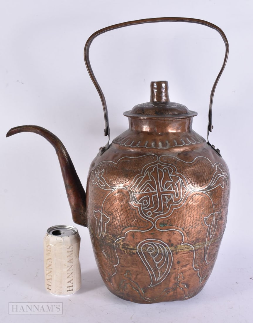 A LARGE 19TH CENTURY ISLAMIC MIDDLE EASTERN SILVER INLAID COPPER EWER. 46 cm x 30 cm. (1 of 3)