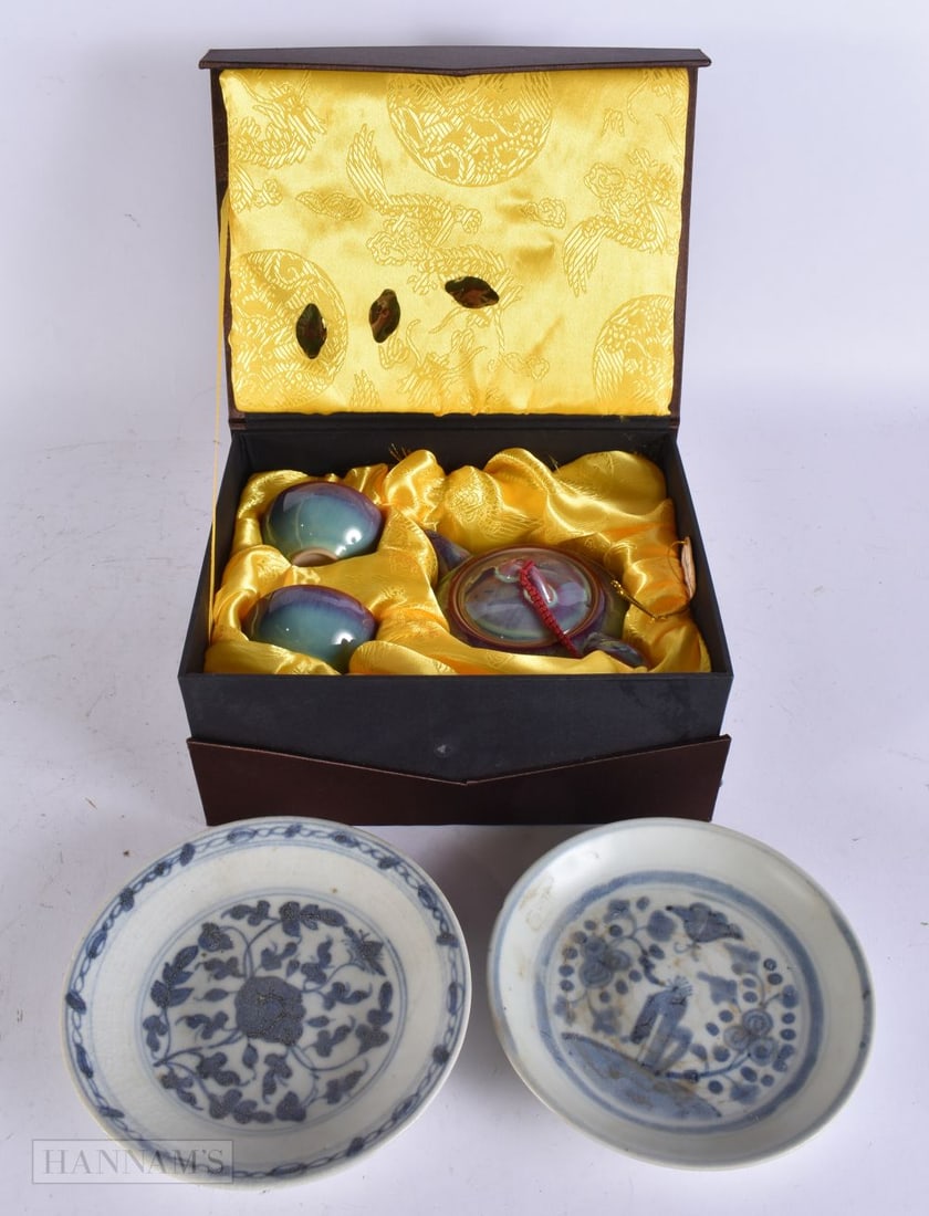 TWO CHINESE TEK SING CARGO BLUE AND WHITE PORCELAIN DISHES together with a boxed teaset. (qty): TWO CHINESE TEK SING CARGO BLUE AND WHITE PORCELAIN DISHES together with a boxed teaset. (qty)