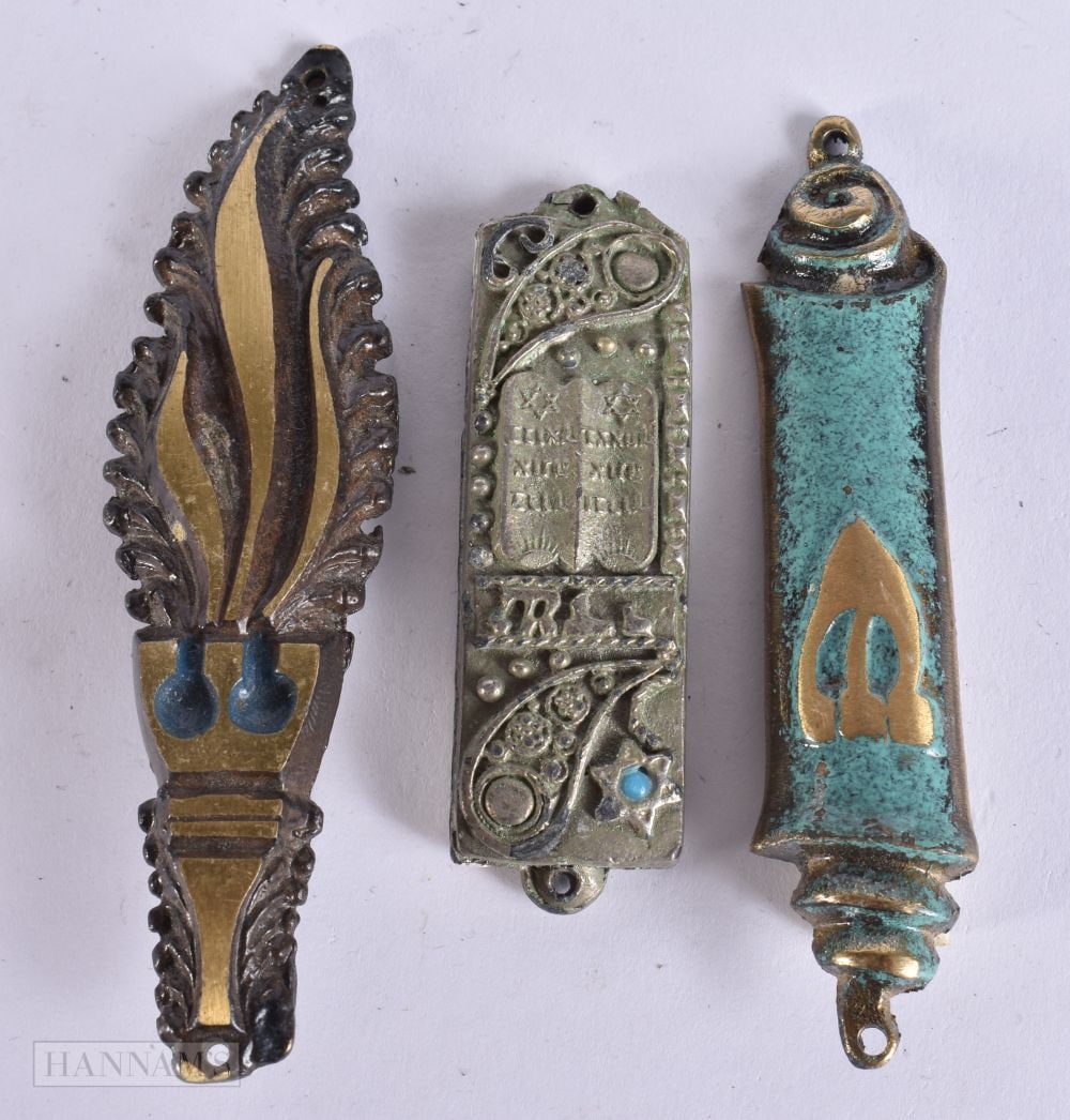 THREE JUDAIC DOOR PLATES. 9.25 cm long. (3): THREE JUDAIC DOOR PLATES. 9.25 cm long. (3)